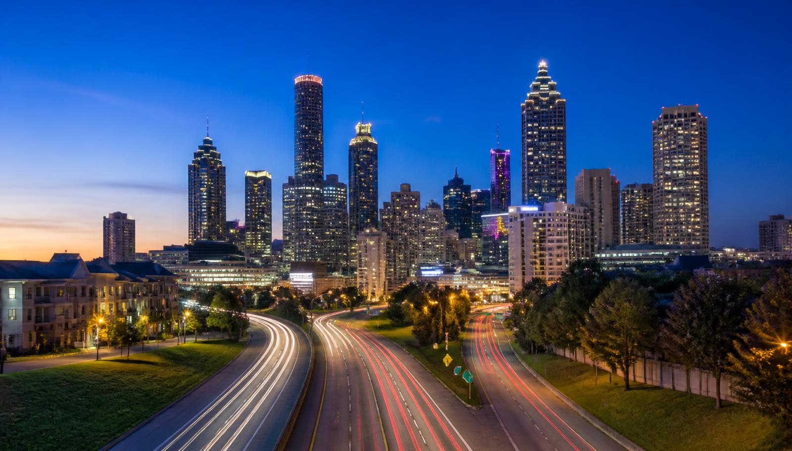 Downtown Atlanta, Georgia skyline at dusk viewed from the interstate